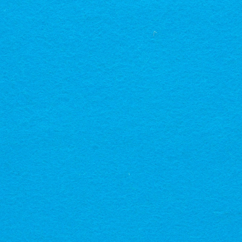 Detailaufnahme von türkisblauem Designfilz mit sichtbarer Oberflächenstruktur