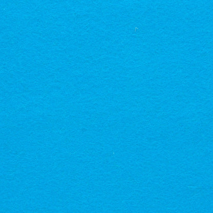 Detailaufnahme von türkisblauem Designfilz mit sichtbarer Oberflächenstruktur