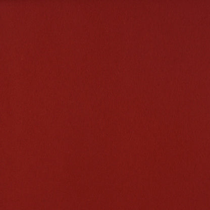 Detailaufnahme von rotem Designfilz mit sichtbarer Oberflächenstruktur