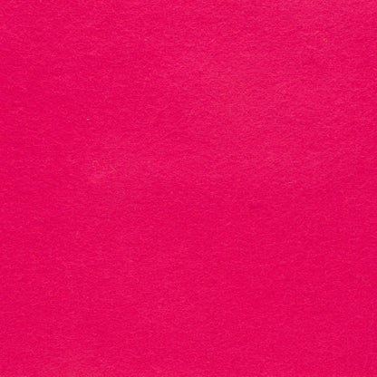 Detailaufnahme von pinkem Designfilz mit sichtbarer Oberflächenstruktur