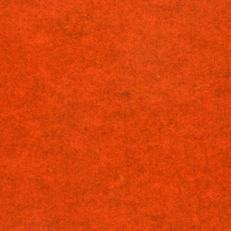Detailaufnahme von orange meliertem Designfilz mit sichtbarer Oberflächenstruktur