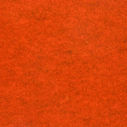 Detailaufnahme von orange meliertem Designfilz mit sichtbarer Oberflächenstruktur