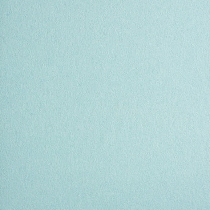 Detailaufnahme von aquafarbenem Designfilz mit sichtbarer Oberflächenstruktur