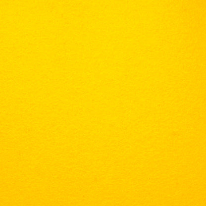 Detailaufnahme von gelbem Designfilz mit sichtbarer Oberflächenstruktur