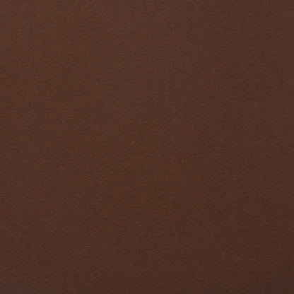 Detailaufnahme von zimtbraunem Designfilz mit sichtbarer Oberflächenstruktur