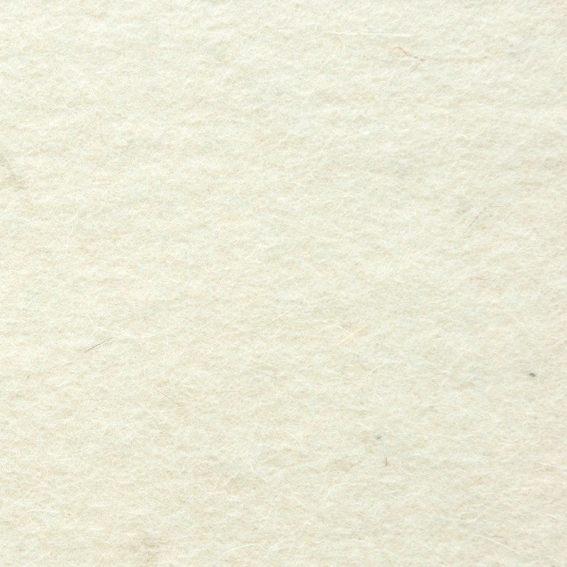 Detailaufnahme von hellem Merinofilz mit sichtbarer Oberflächenstruktur