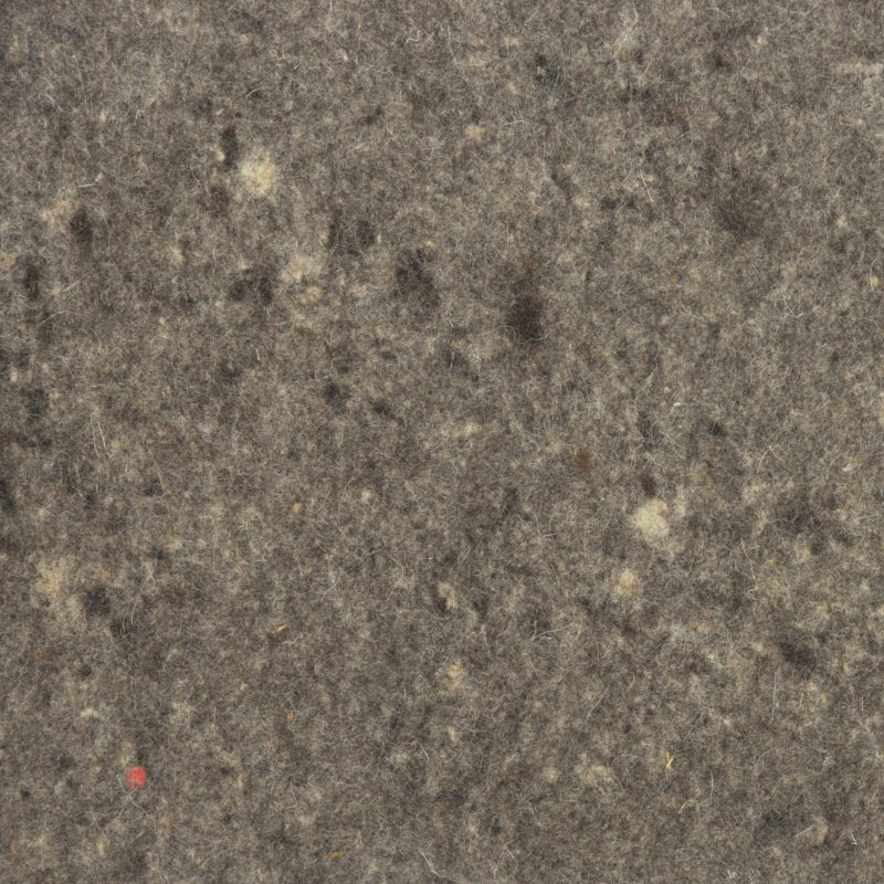 Detailaufnahme von mehrfarbigem Sattelfilz mit sichtbarer Oberflächenstruktur