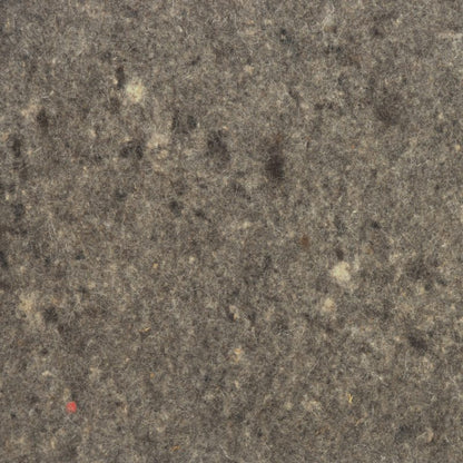 Detailaufnahme von mehrfarbigem Sattelfilz mit sichtbarer Oberflächenstruktur